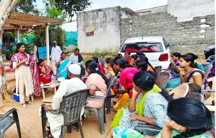 Photo showing demonstration of residual chlorine testing, at Shanti Nagar